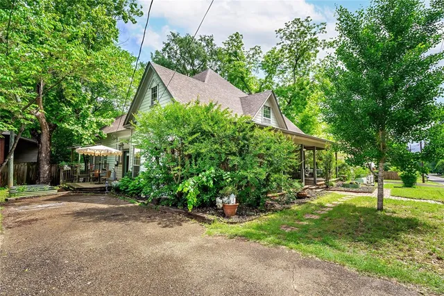 a view of a house with a park