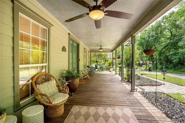 a lobby with furniture and floor to ceiling window
