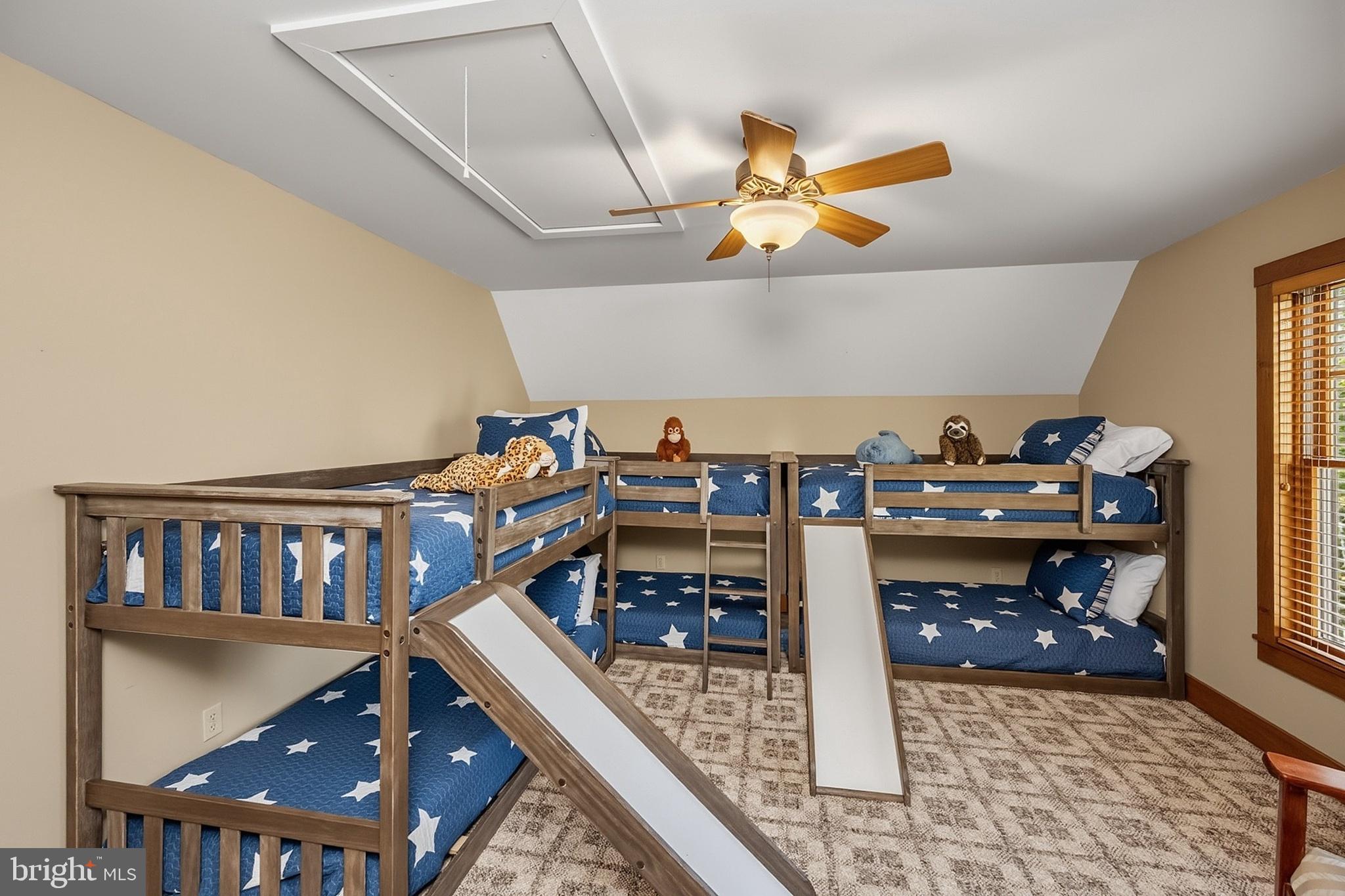 185 Ruta Lane Swanton, MD 21561 - Photo 65 of 81 a bed room with furniture and a book shelf