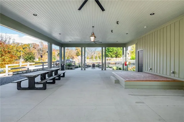 a picture of a bench in front of a wall