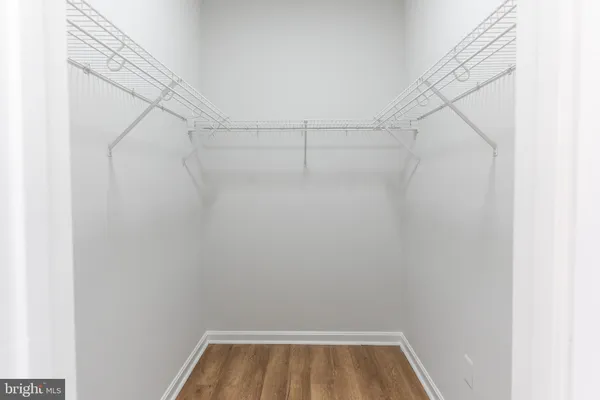 a view of a room with racks on the wall