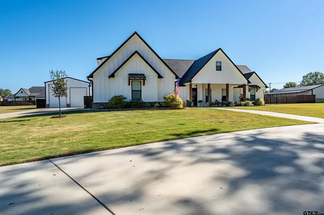 a view of a house with a swimming pool
