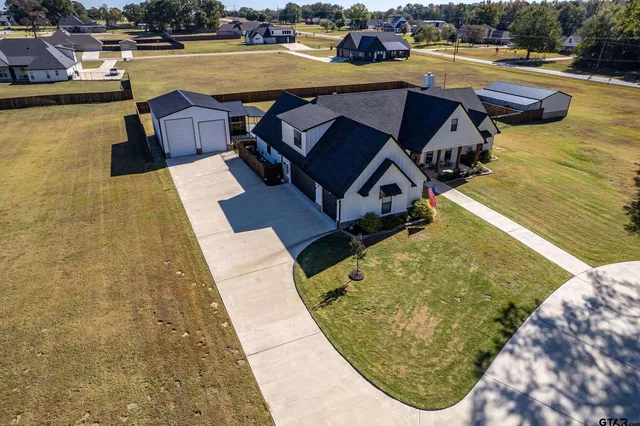 swimming pool view with a seating space