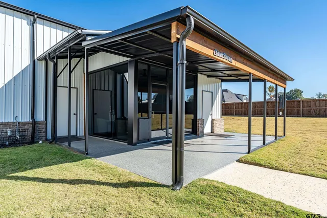 a view of a swimming pool with a lounge chair