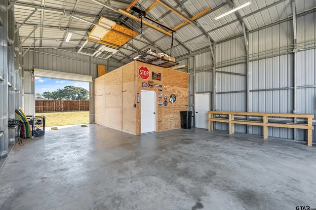 a view of a swimming pool with an outdoor space and seating area