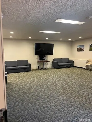 a bathroom with a sink a mirror and a shower