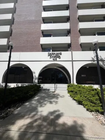a view of yard with car parked