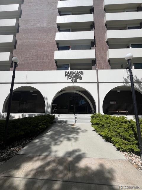 415 South Howes Street, Unit N304 Fort Collins, CO 80521 - Photo 2 of 21 a view of yard with car parked