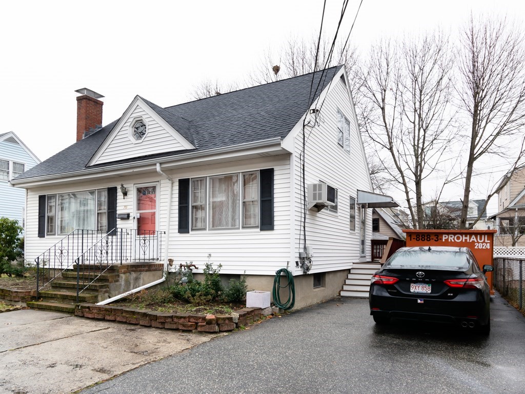 70 Edgemere Road Boston, MA 02132 - Photo 3 of 39 a view of a car park in front of house