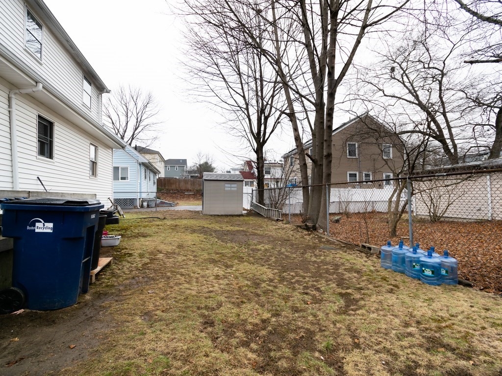 70 Edgemere Road Boston, MA 02132 - Photo 4 of 39 a view of a backyard with large trees