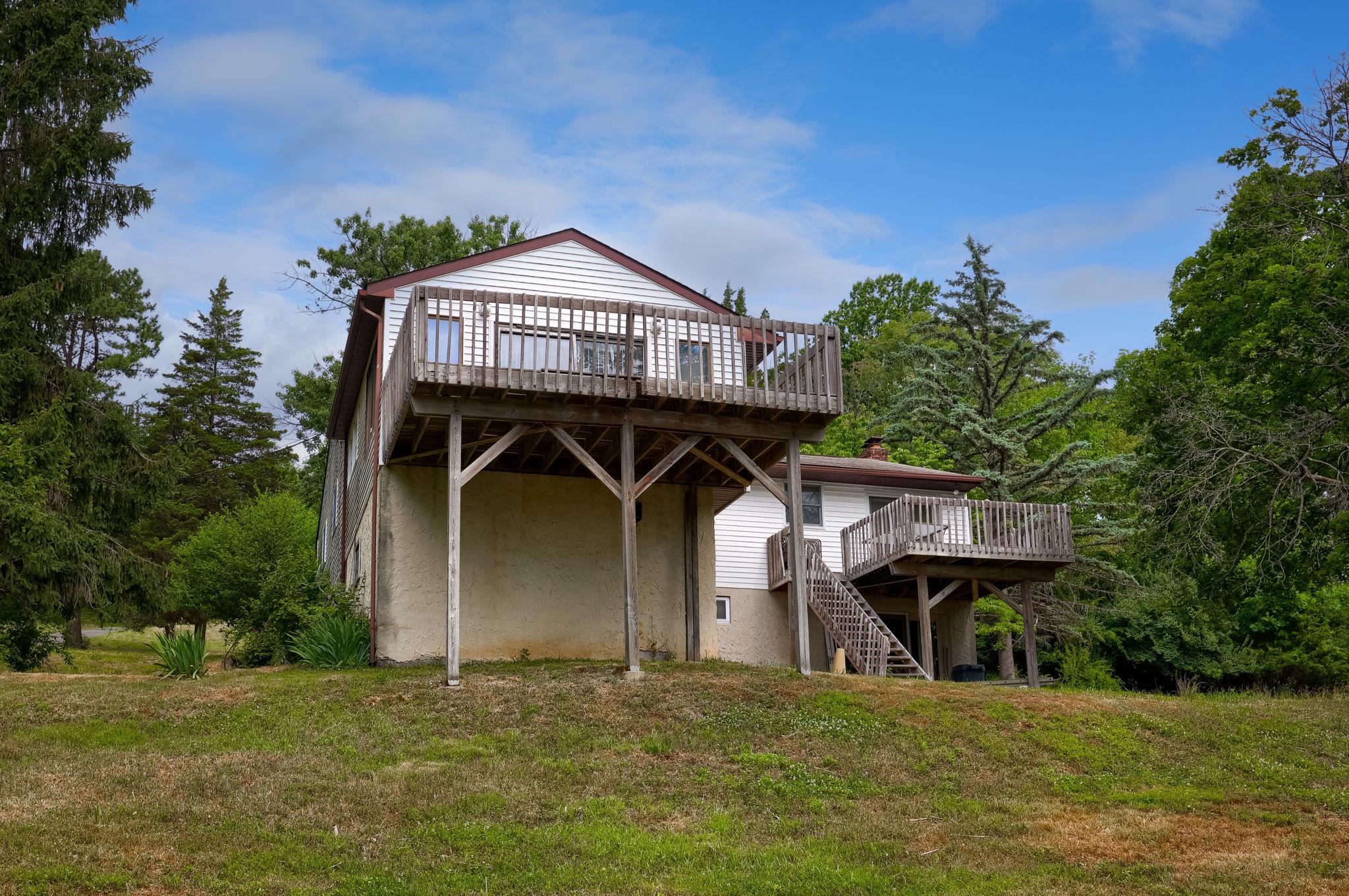 49 Preston Road Reading, PA 19608 - Photo 2 of 42 Charming hillside retreat with deck.