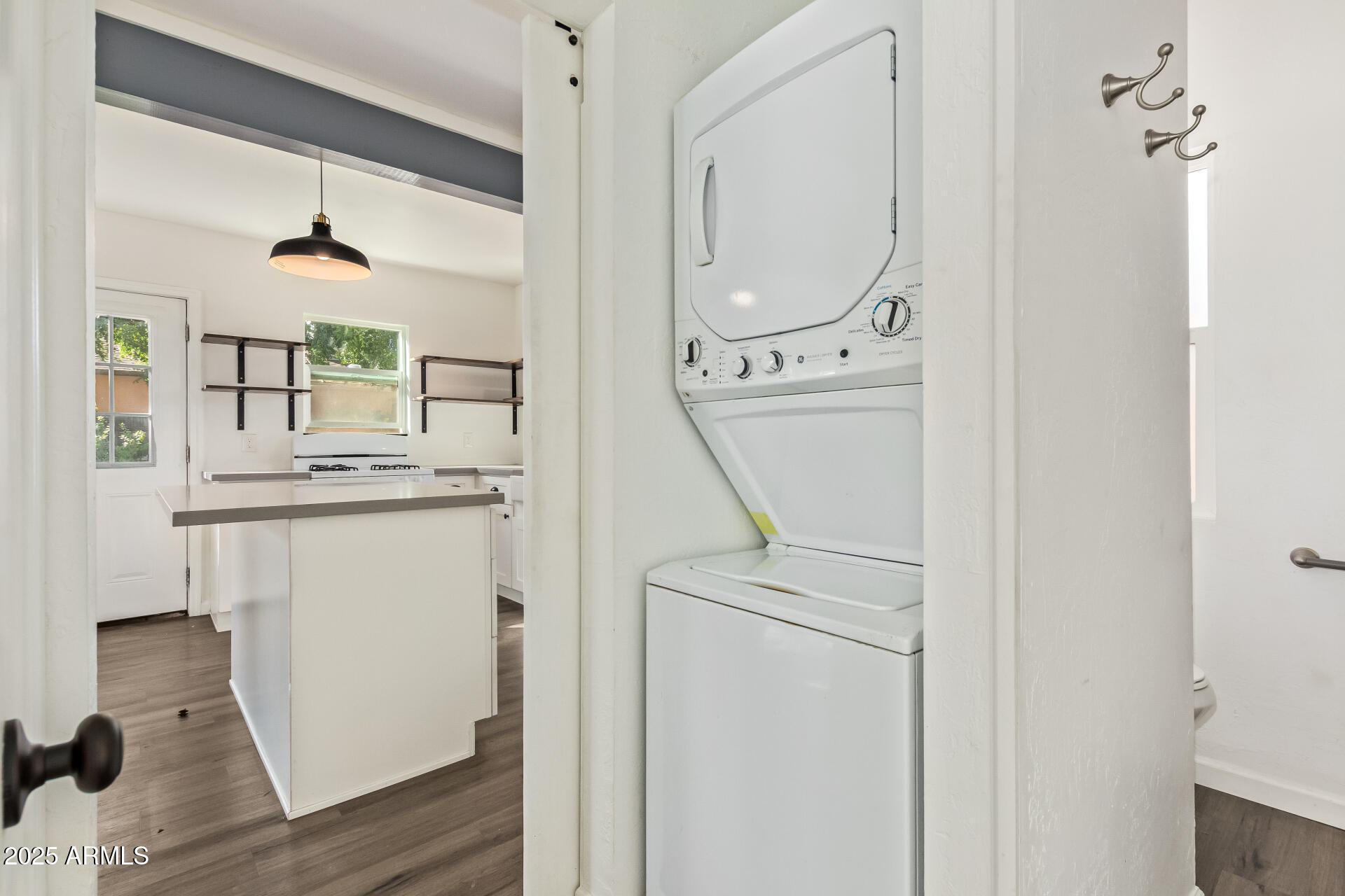 336 Virginia Avenue Phoenix, AZ 85003 - Photo 28 of 29 a utility room with cabinets washer and dryer