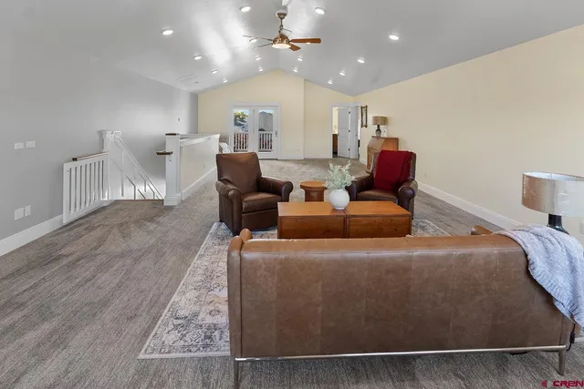 a bathroom with a sink a mirror and a shower