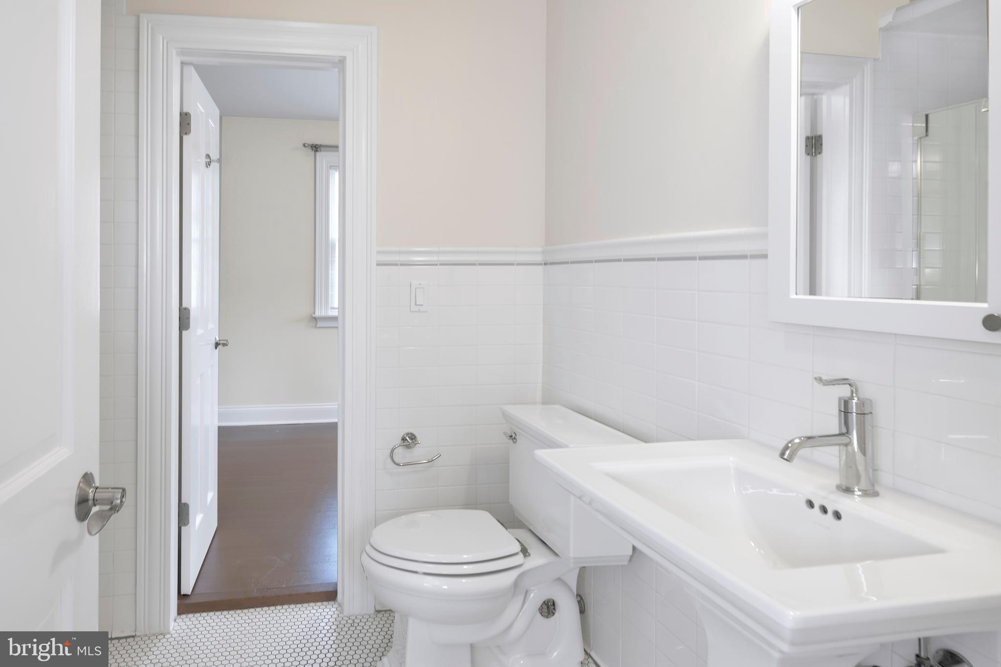 44 Wiggins Street Princeton, NJ 08540 - Photo 25 of 41 a bathroom with a sink toilet and shower