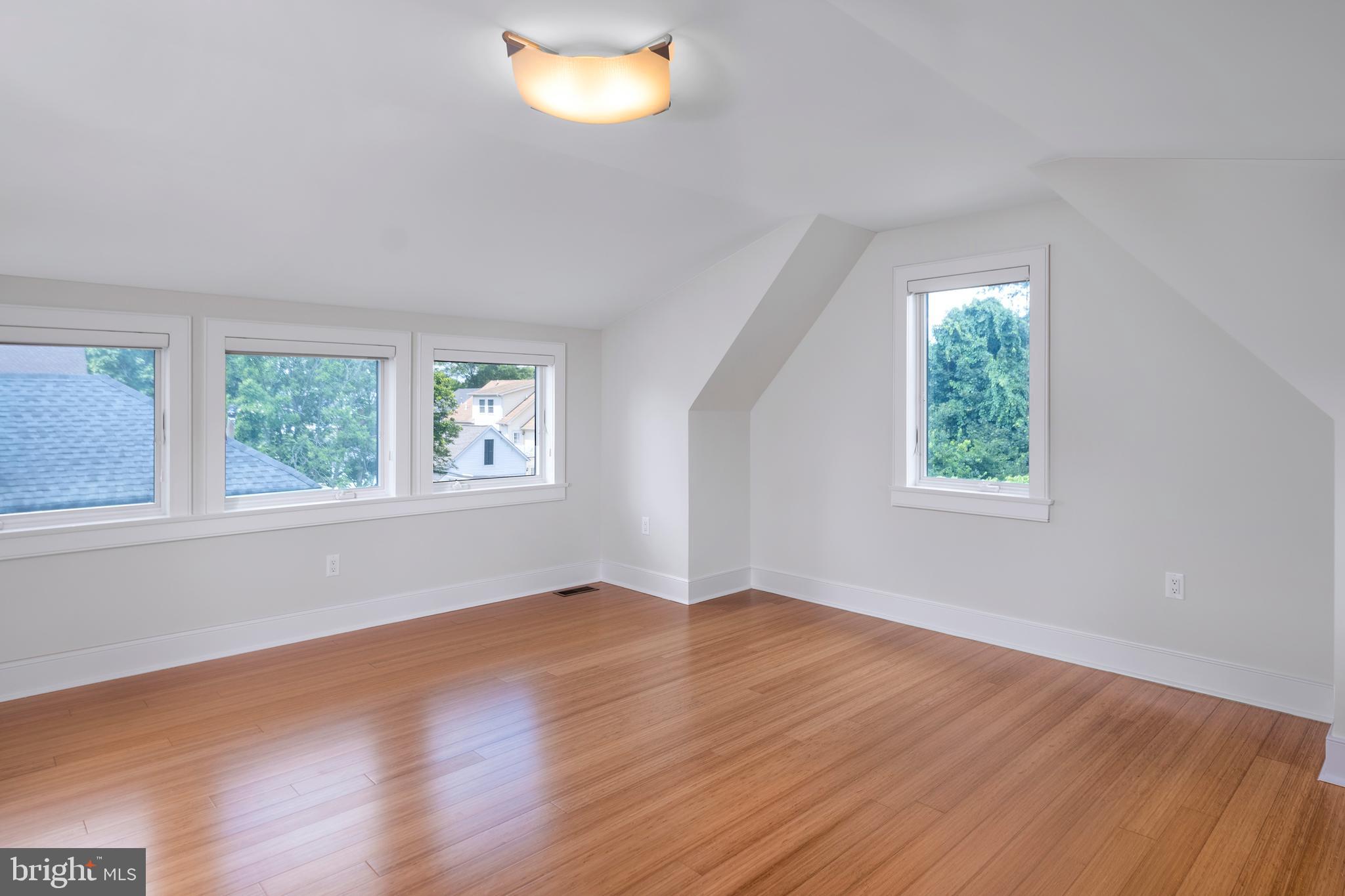 44 Wiggins Street Princeton, NJ 08540 - Photo 29 of 41 an empty room with wooden floor and windows