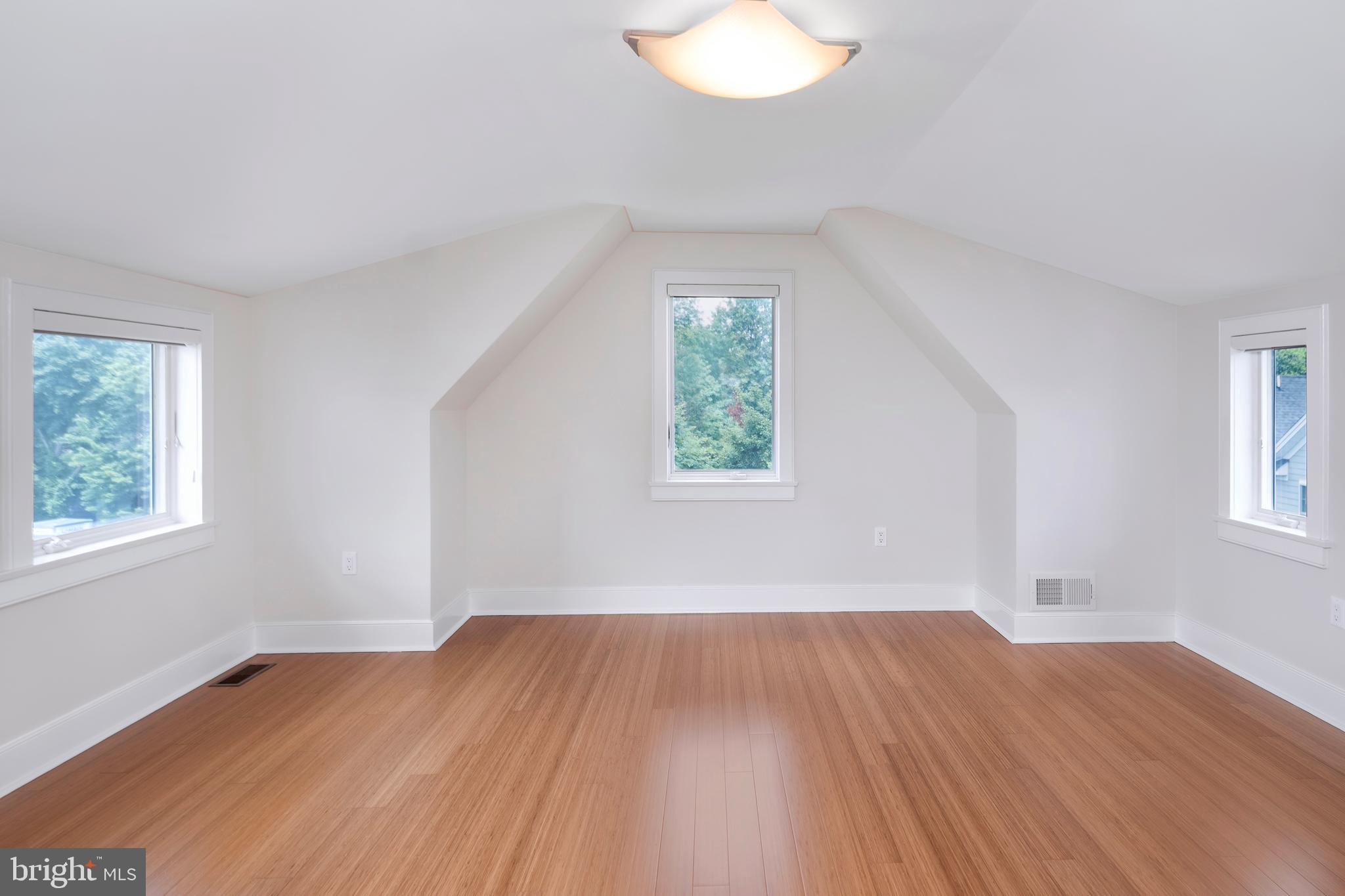 44 Wiggins Street Princeton, NJ 08540 - Photo 30 of 41 an empty room with wooden floor and windows