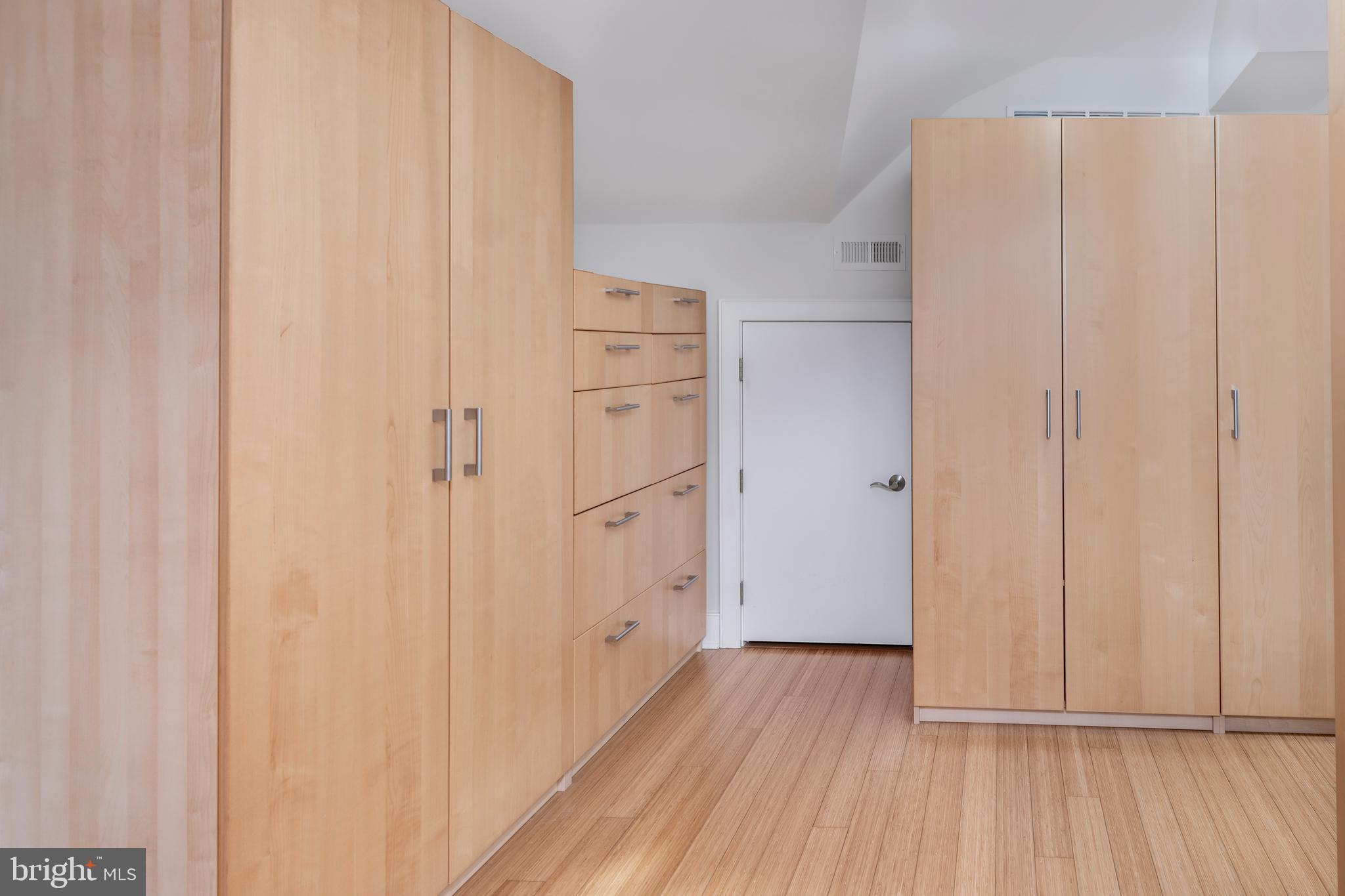 44 Wiggins Street Princeton, NJ 08540 - Photo 31 of 41 a view of walk in closet with wooden floor