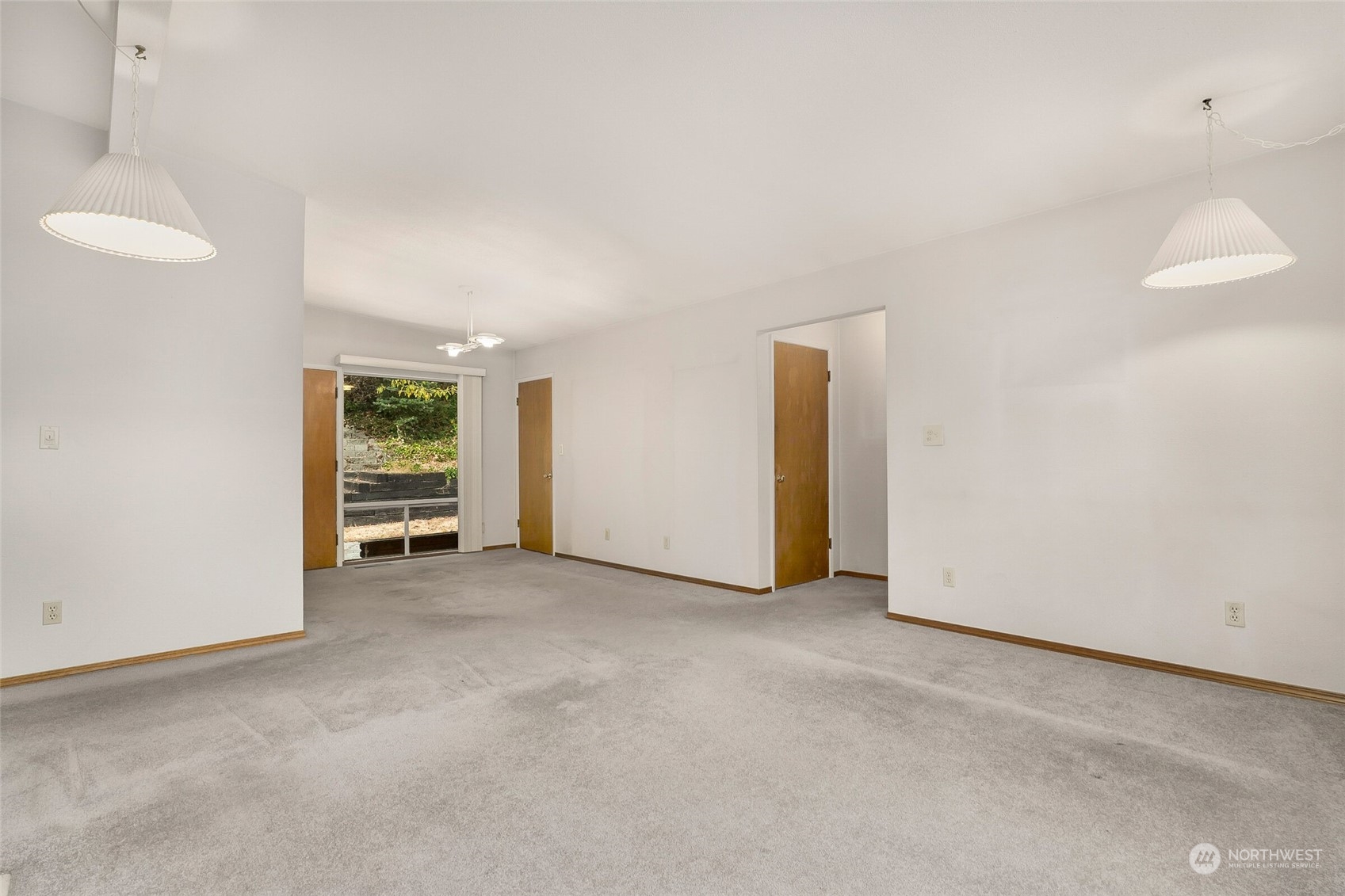 14624 Southeast Allen Rd. Bellevue, WA 98006 - Photo 6 of 26 a view of an empty room with a window