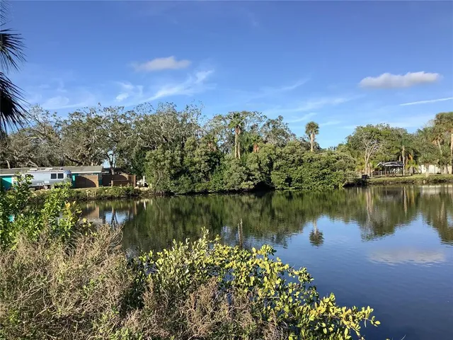 a view of a lake with a city