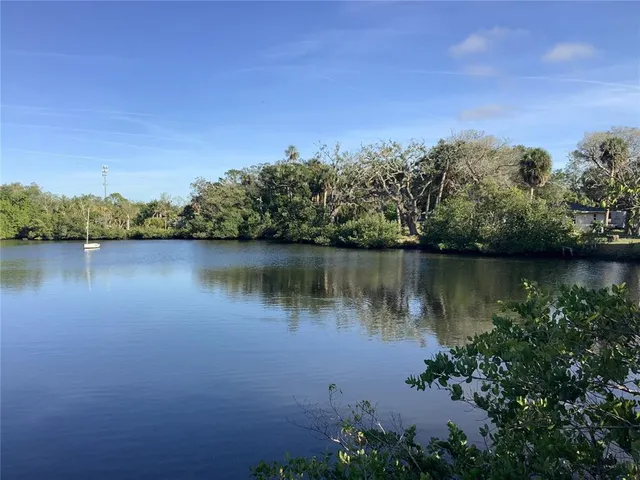 a view of a lake with a city view