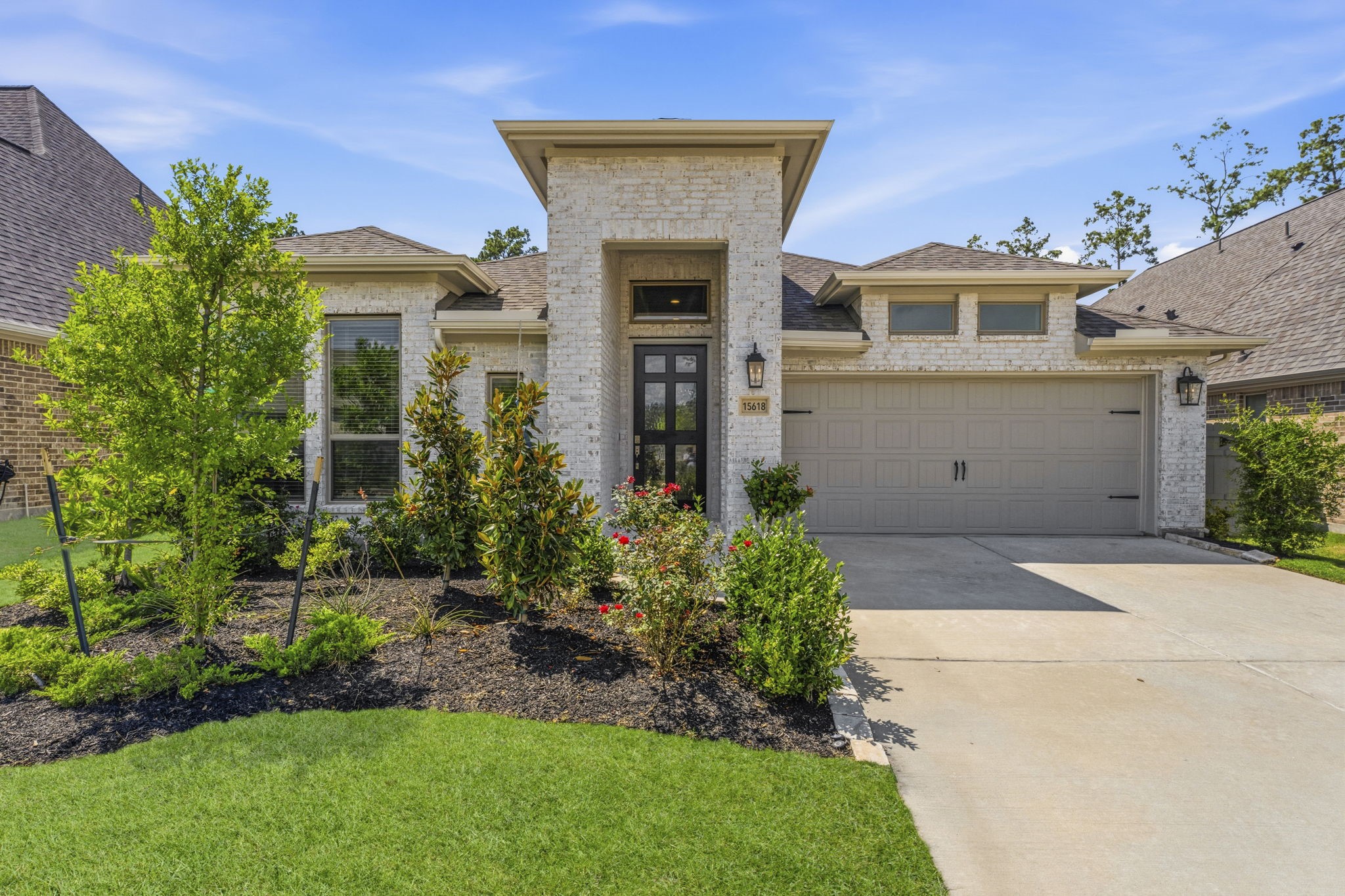 15618 Turtlehead Trail Conroe, TX 77302 - Photo 1 of 50 Welcome to your New Home in the Master Planned community of Artavia! Beautiful Landscaping greets you at your 4 Sided Bricked One Story w/ Full Gutters, Gorgeous Mahogany Glass Front Door, Full Gutters, Double Wide Driveway, Single Garage Door and 3 Car Tandem Garage!