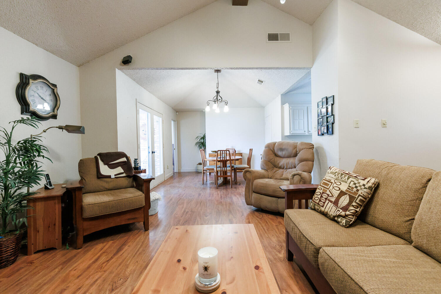 5728 92nd Street Lubbock, TX 79424 - Photo 12 of 40 a living room with furniture and wooden floor