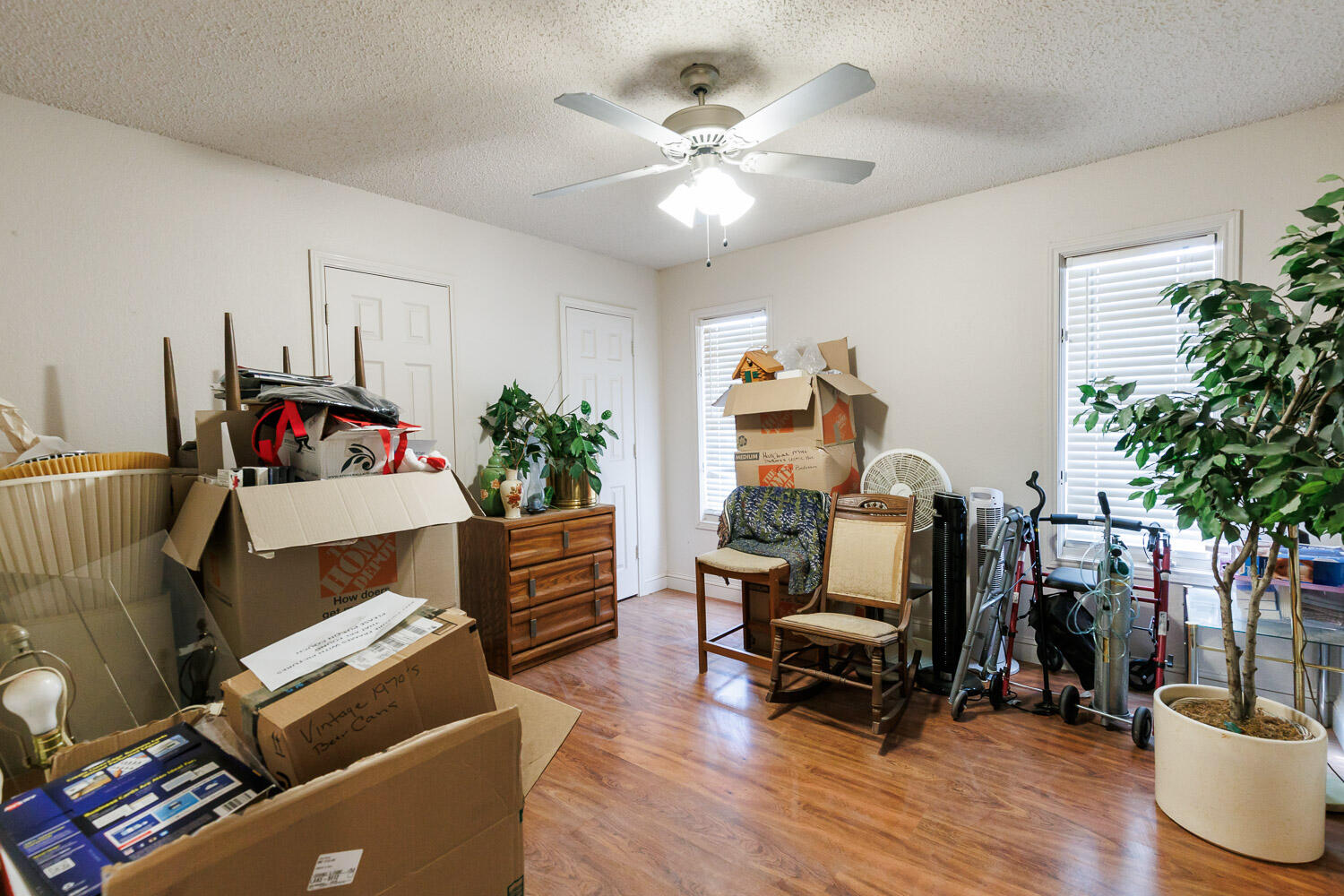 5728 92nd Street Lubbock, TX 79424 - Photo 30 of 40 a living room with furniture and a potted plant