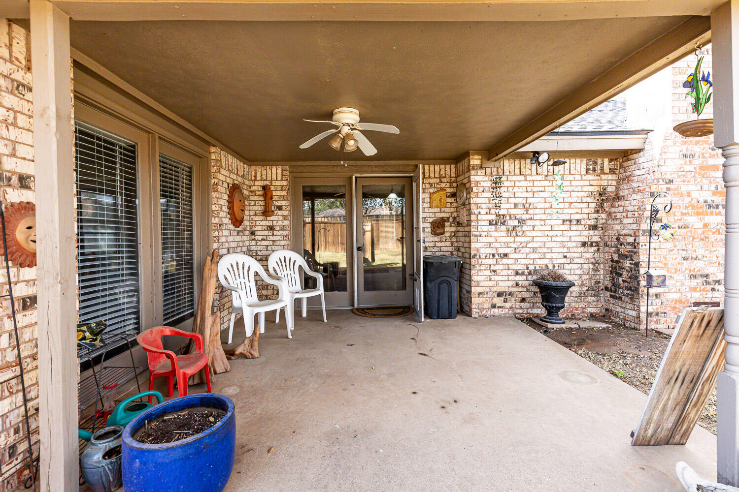 5728 92nd Street Lubbock, TX 79424 - Photo 35 of 40 a dining room with furniture and a large window