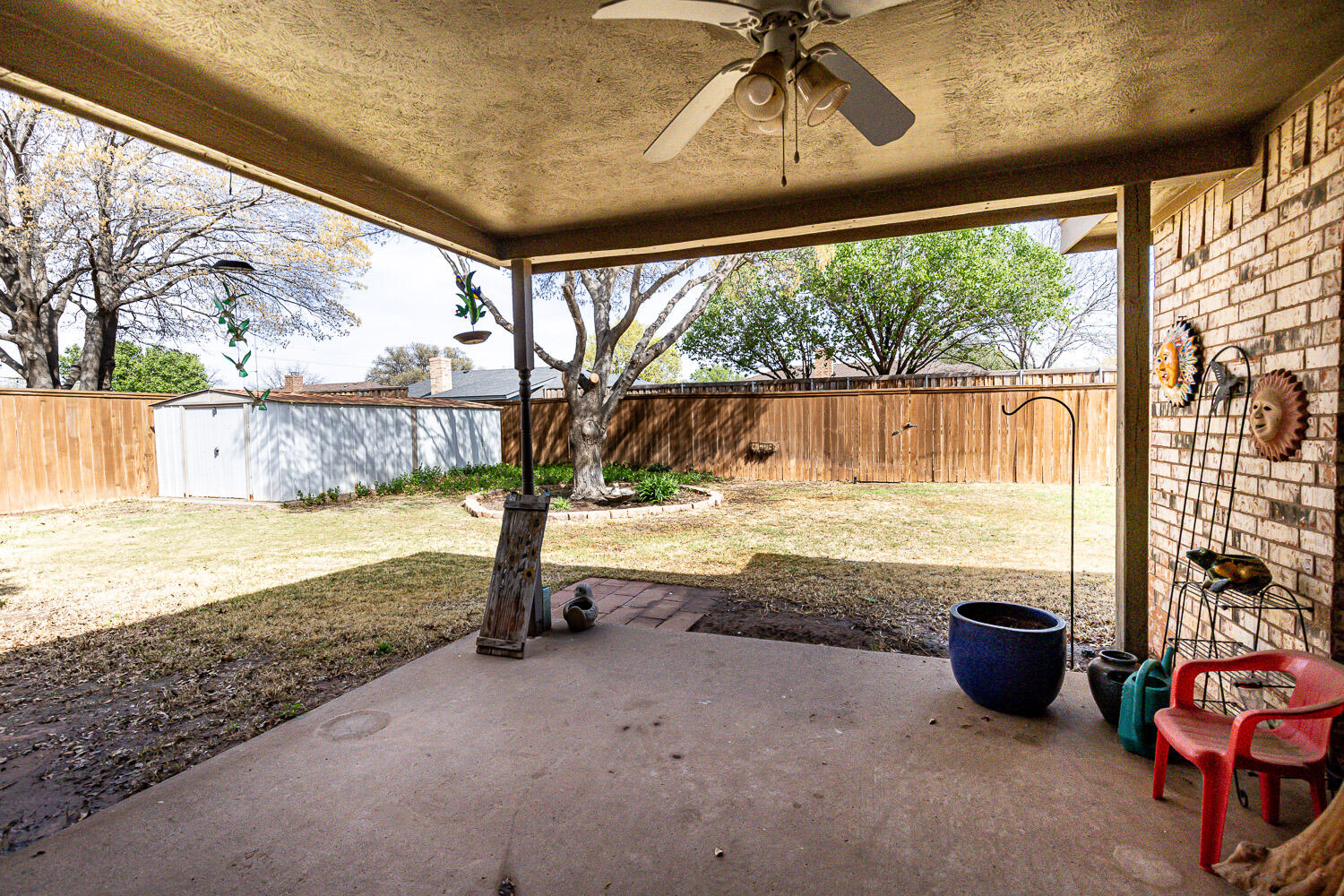 5728 92nd Street Lubbock, TX 79424 - Photo 36 of 40 a view of swimming pool with a patio and a yard