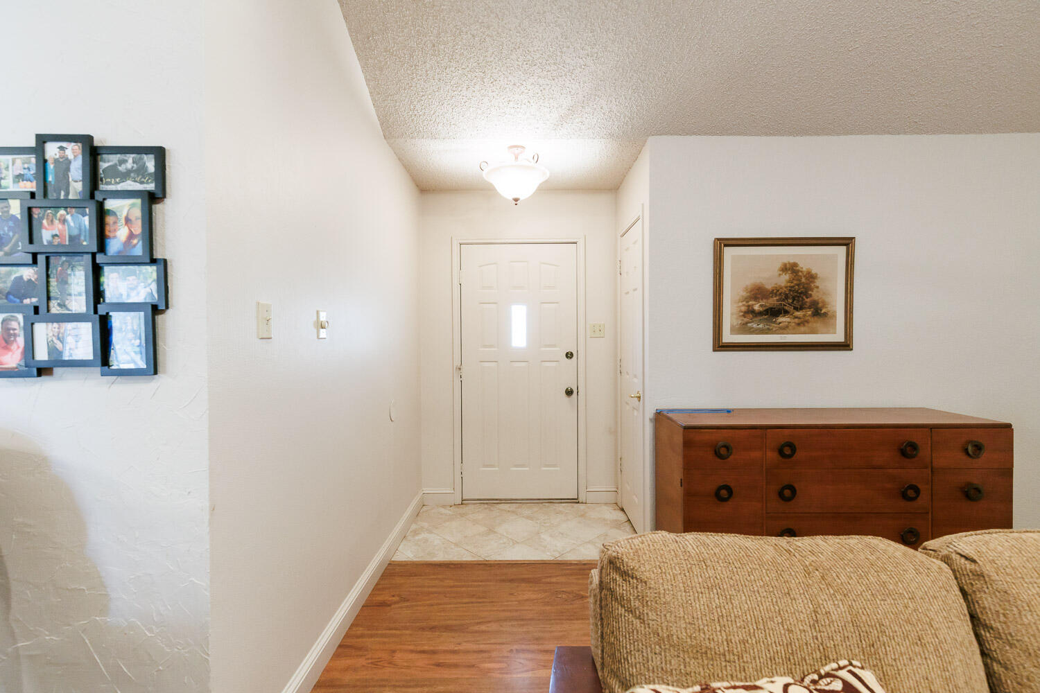 5728 92nd Street Lubbock, TX 79424 - Photo 8 of 40 a bedroom with a bed and a painting on the wall