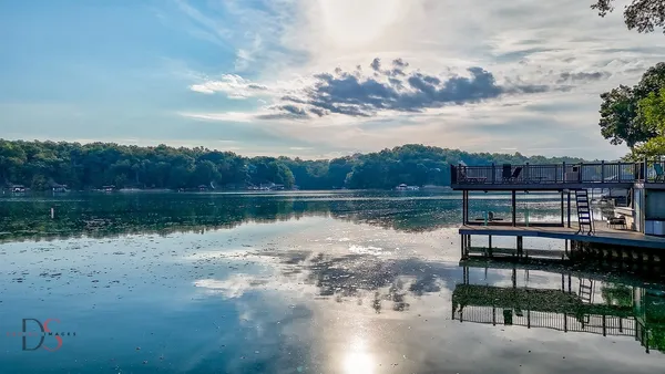 a view of a lake with a city