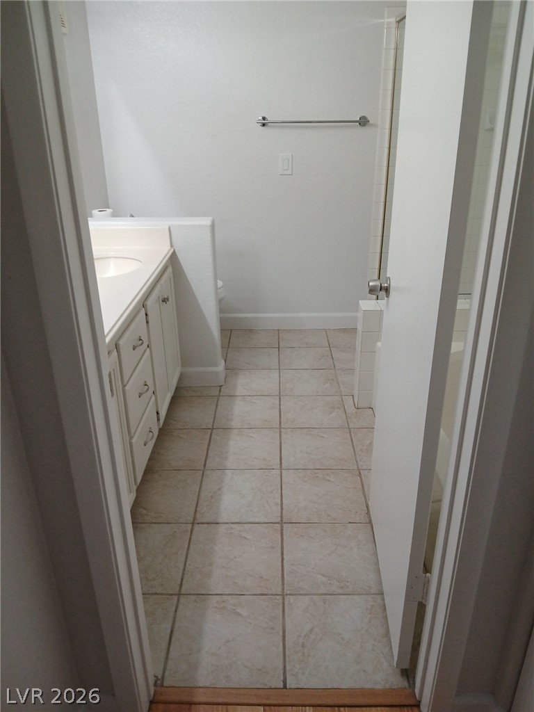 2201 Ramsgate Drive, Unit 426 Henderson, NV 89074 - Photo 15 of 22 This clean bathroom features a spacious vanity and sleek tile flooring.