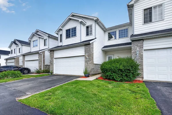 $292,000 | 1738 Waters Edge Drive, Unit 1738, Minooka, IL 60447