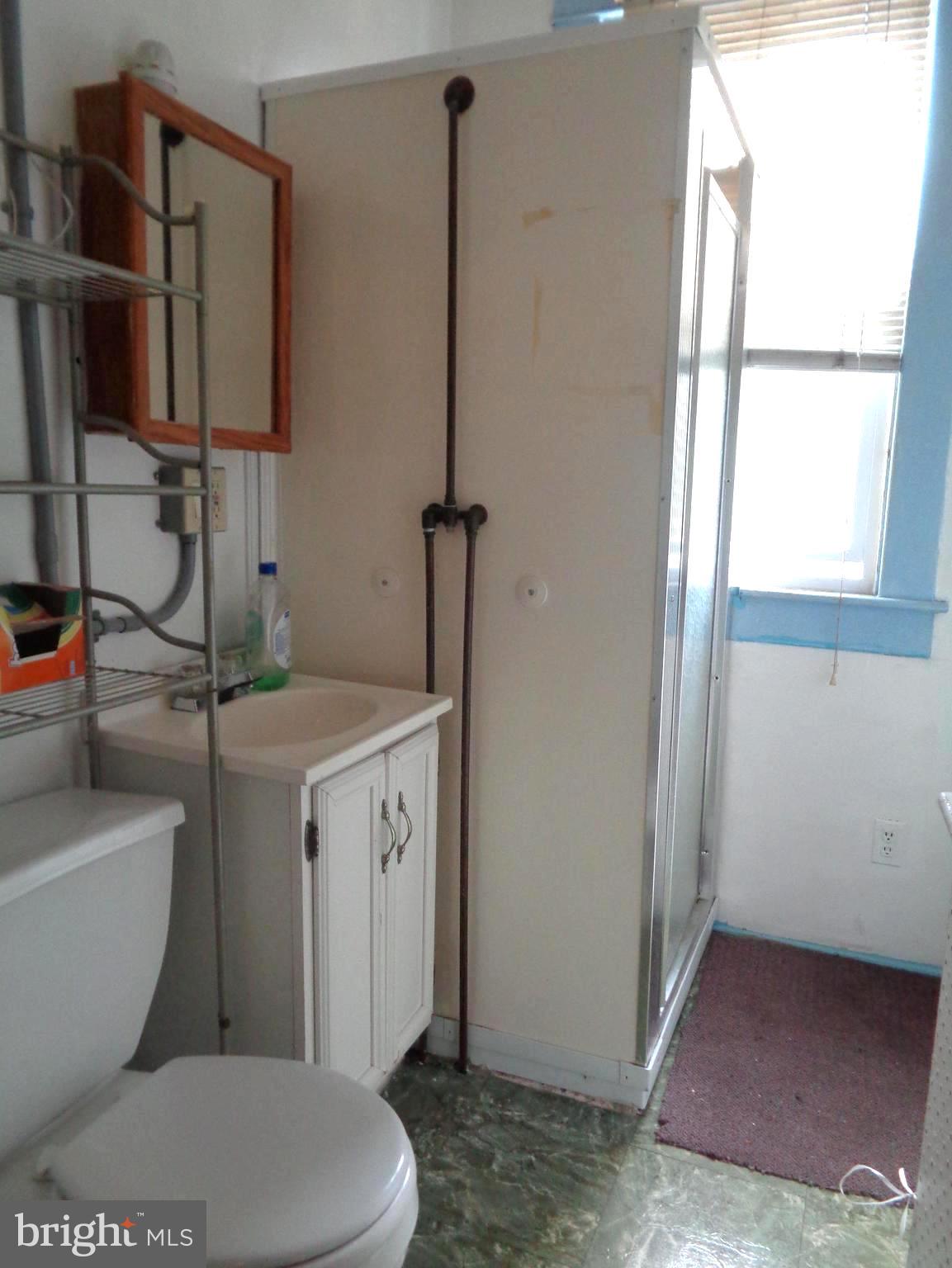6927 Harford Road Baltimore, MD 21234 - Photo 10 of 20 First floor full bathroom