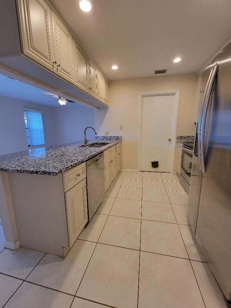 1087 Goldenrod Road Wellington, FL 33414 - Photo 3 of 15 20220309_094811_resized