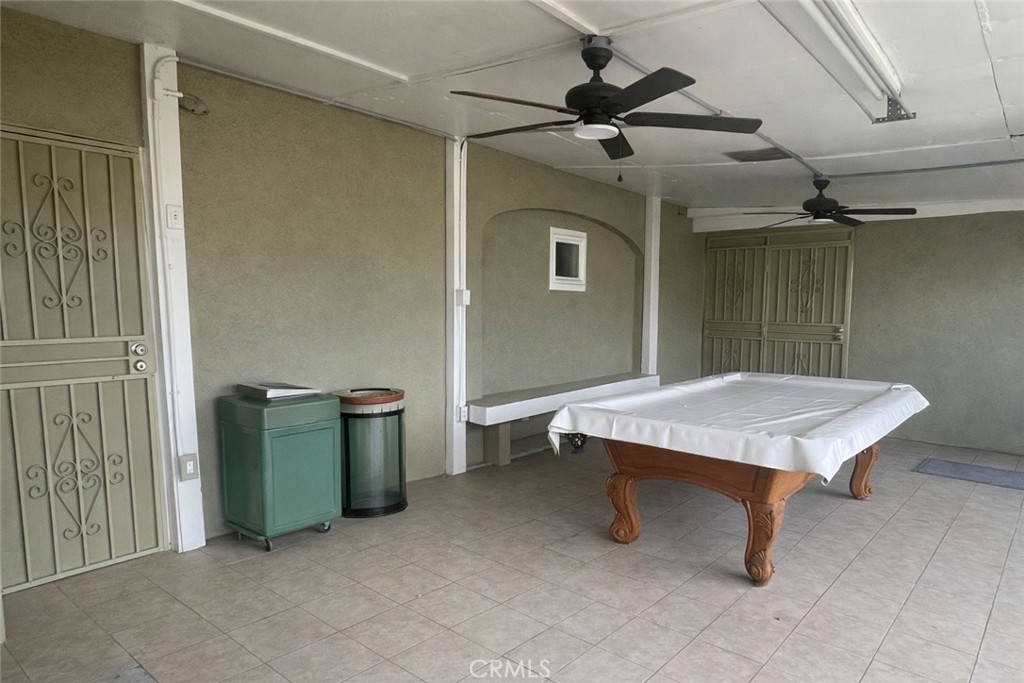 26326 Investors Hemet, CA 92544 - Photo 46 of 46 a room with pool table and a ceiling fan