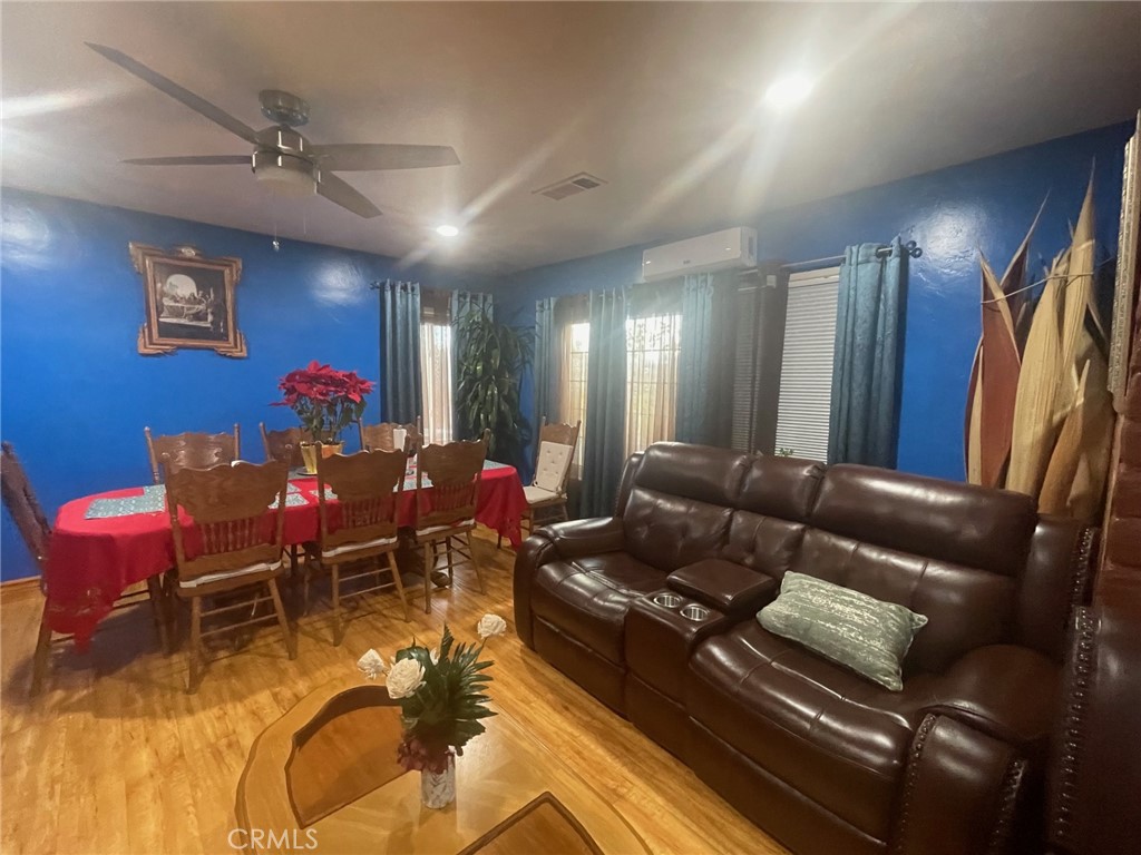26326 Investors Hemet, CA 92544 - Photo 10 of 46 a living room with furniture and a rug