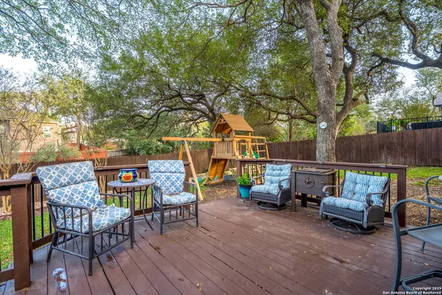 a view of a patio with furniture and a stove