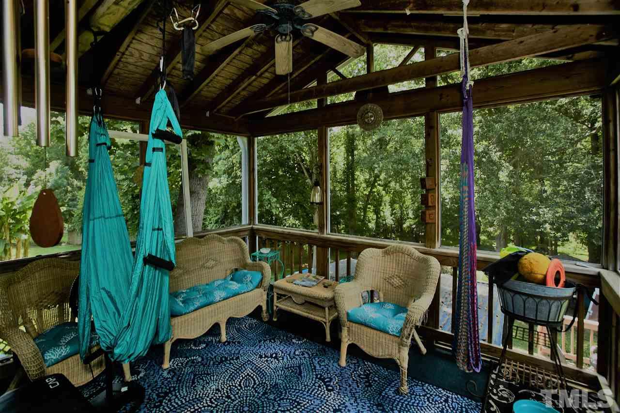 517 Jordan Ridge Lane Raleigh, NC 27603 - Photo 15 of 16 a balcony with furniture and next to a window