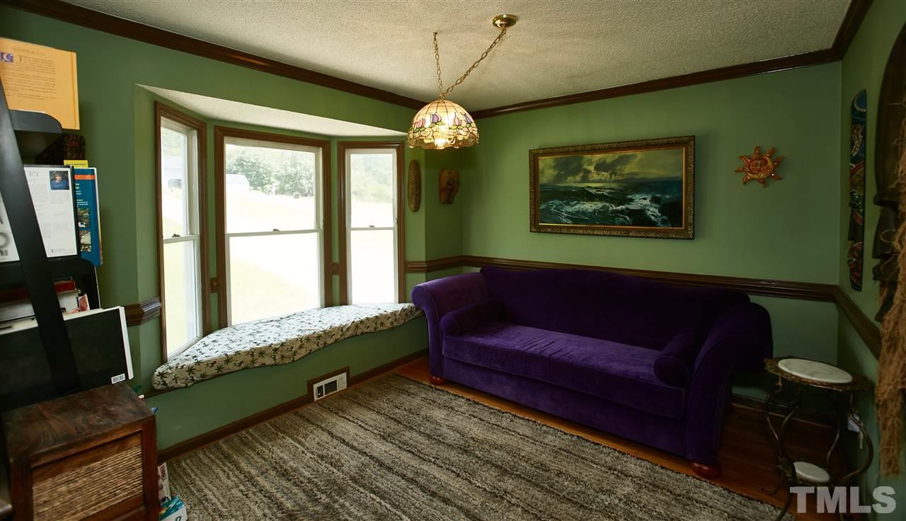 517 Jordan Ridge Lane Raleigh, NC 27603 - Photo 5 of 16 a living room with furniture and a window