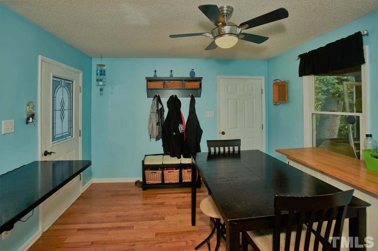 517 Jordan Ridge Lane Raleigh, NC 27603 - Photo 8 of 16 a living room with furniture pool table and flat screen tv