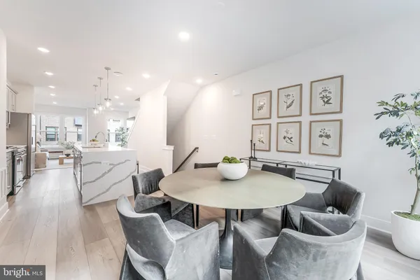 a view of a dining room with furniture