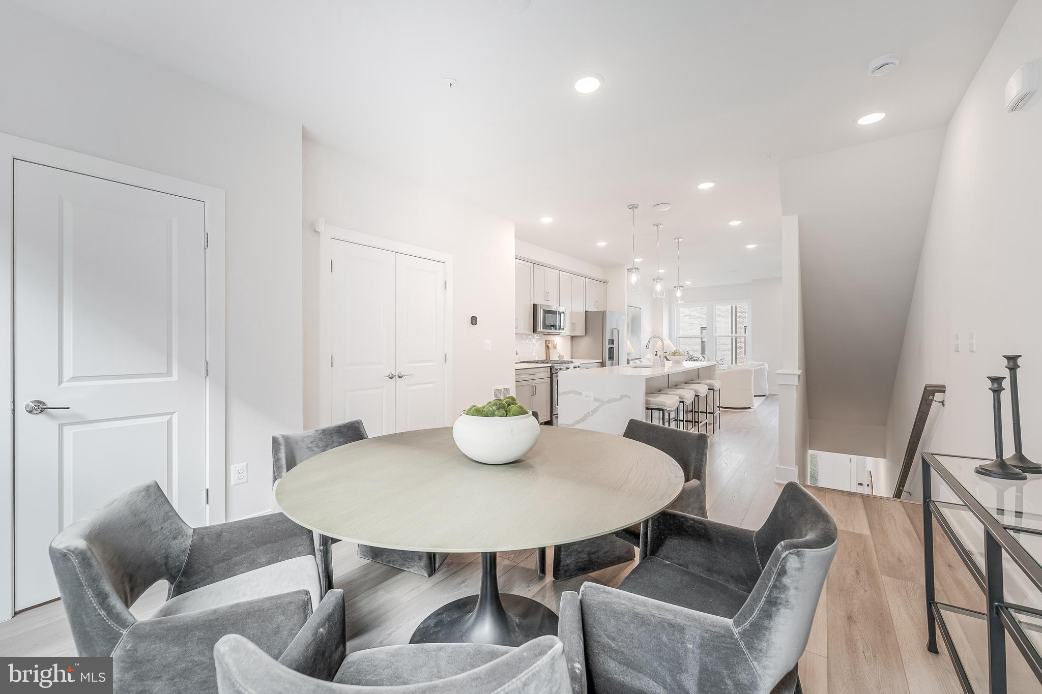 12742 Verdant Way Reston, VA 20191 - Photo 14 of 51 a view of a dining room with furniture