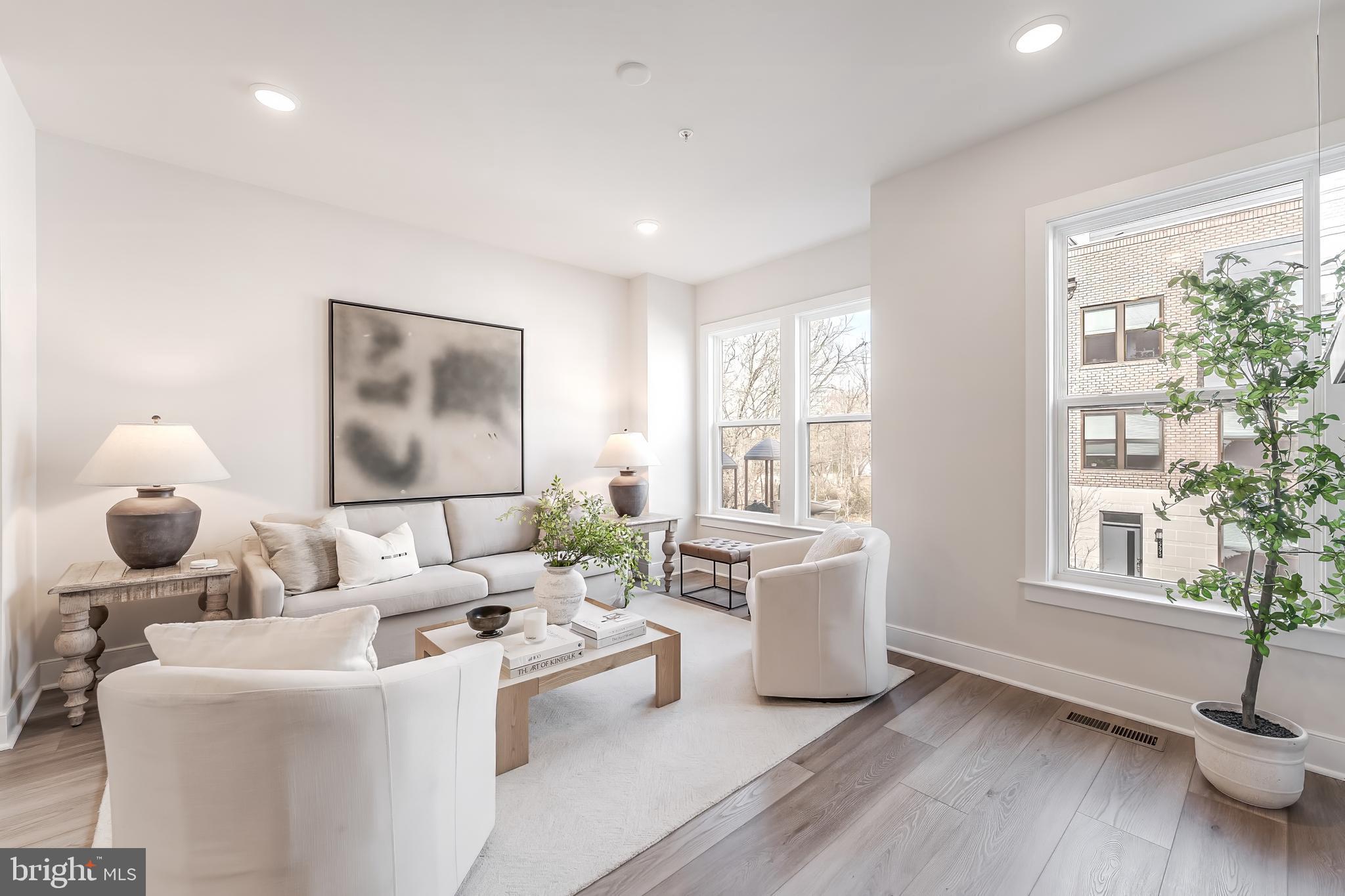12742 Verdant Way Reston, VA 20191 - Photo 16 of 51 a living room with furniture and wooden floor