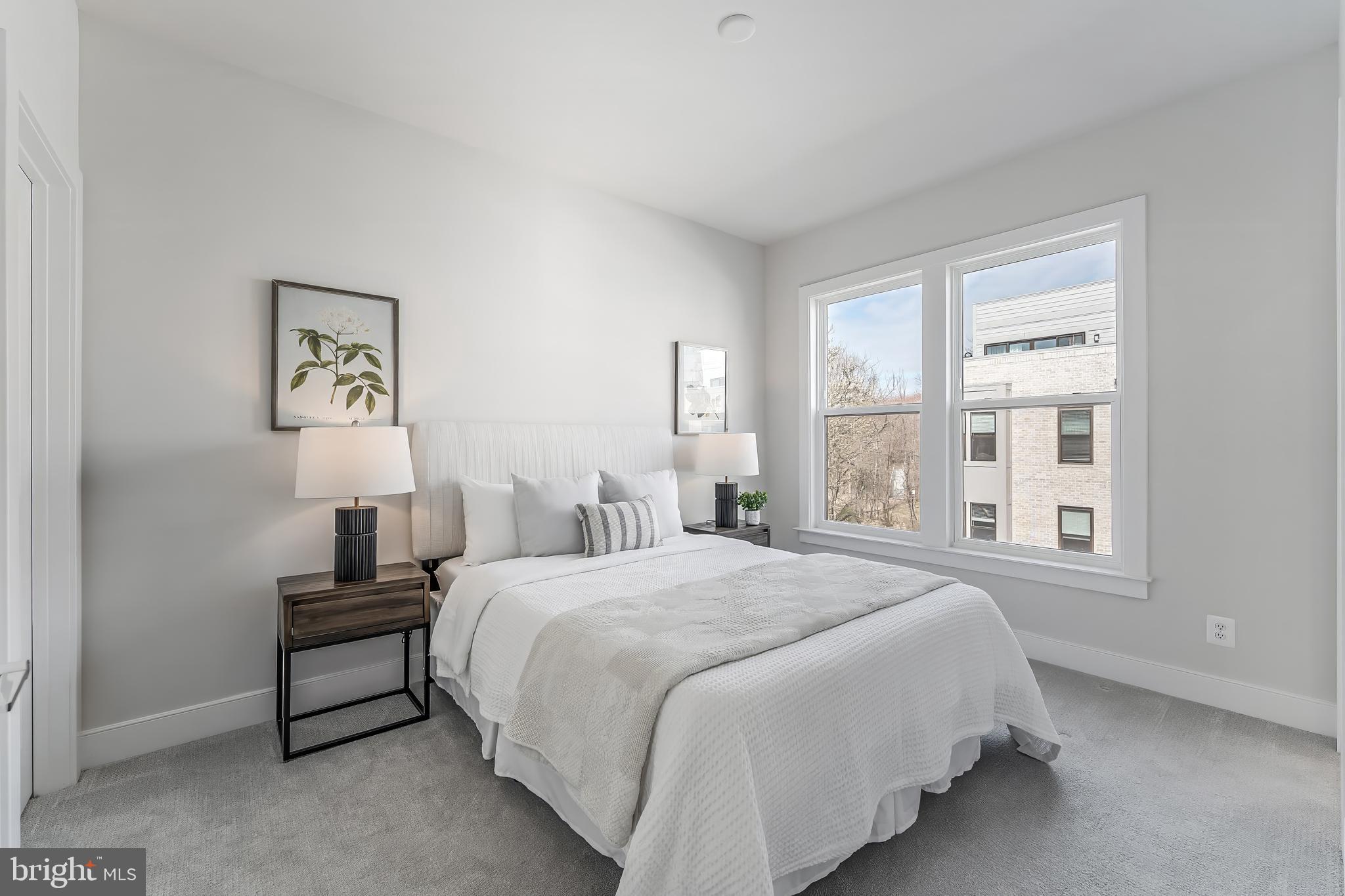 12742 Verdant Way Reston, VA 20191 - Photo 30 of 51 a bedroom with a bed and a window