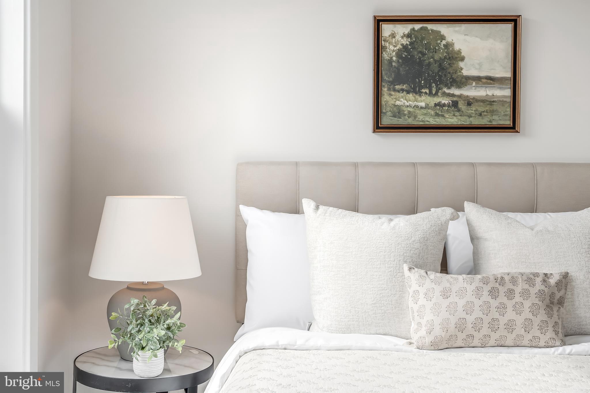 12742 Verdant Way Reston, VA 20191 - Photo 41 of 51 a bedroom with a bed and a painting on the wall