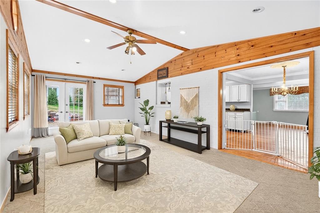 910 Burchfield Road Allison Park, PA 15101 - Photo 12 of 21 a living room with furniture and a large window