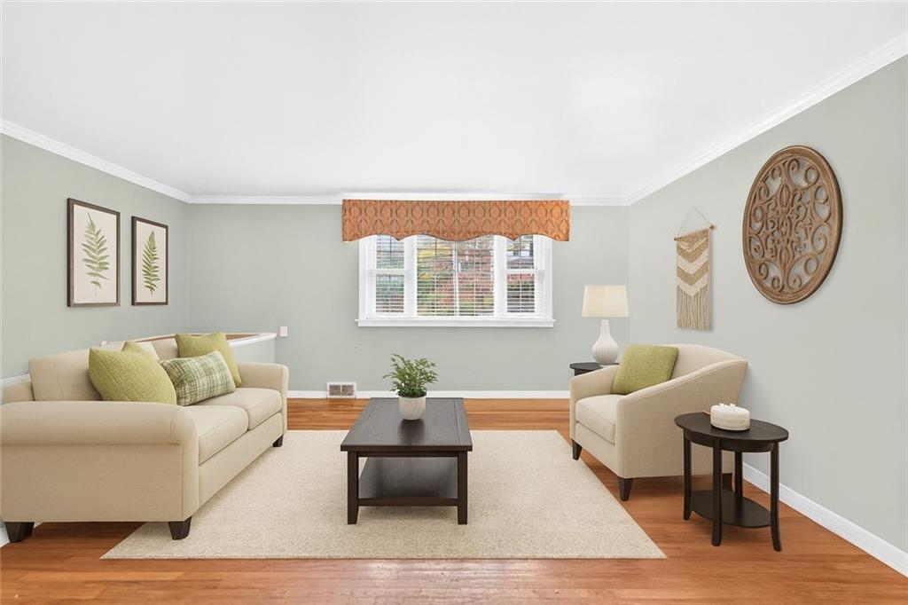 910 Burchfield Road Allison Park, PA 15101 - Photo 8 of 21 a living room with furniture and a large window