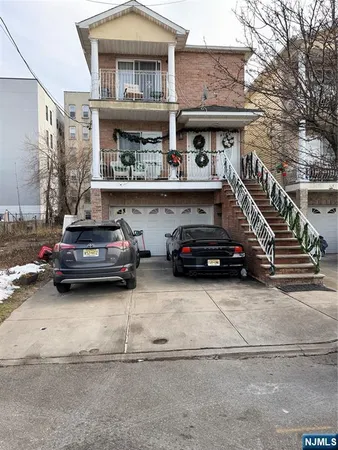a car parked in front of a house