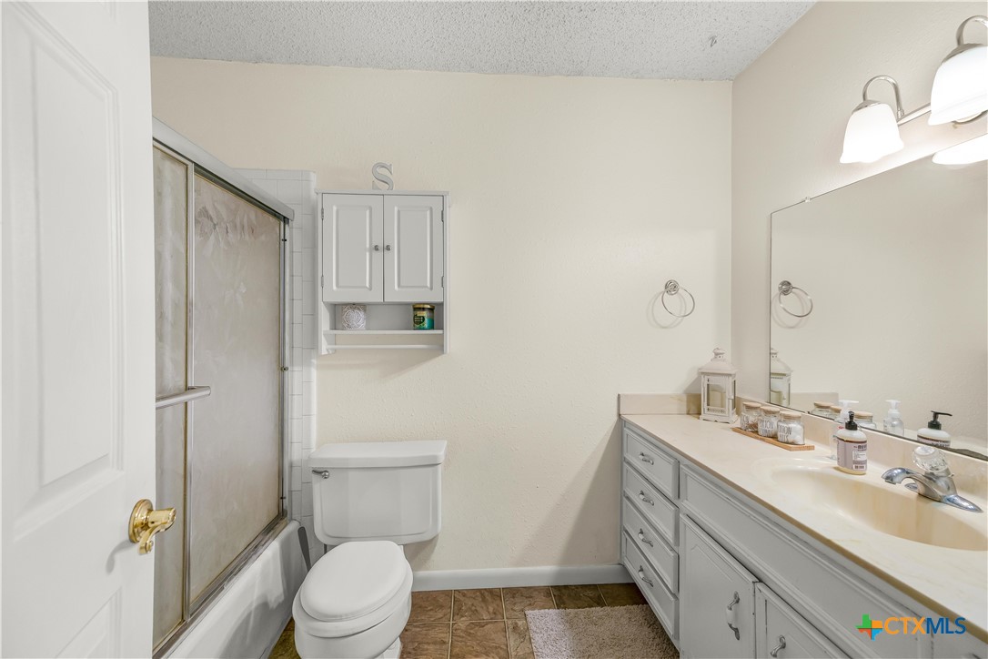 307 Pheasant Drive Victoria, TX 77905 - Photo 13 of 33 a bathroom with a sink a toilet and shower